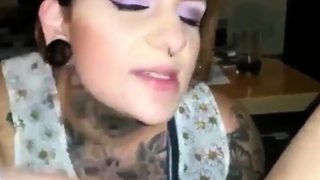 Tatted chick sucks dick
